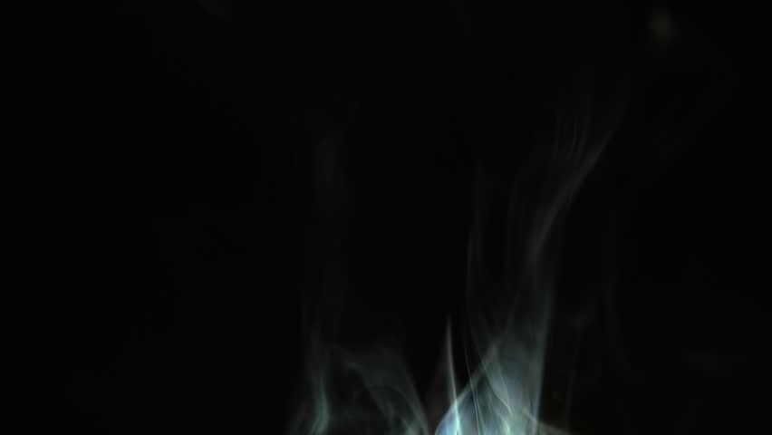 Smoke rises slowly upwards on a black background, abstract smoke tongues, screensaver or overlay video.  | Shutterstock HD Video #1101128285