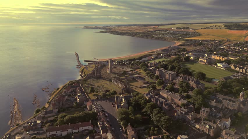 Wide generic aerial view of St Andrews town and coastline in Scotland UK Royalty-Free Stock Footage #1101135243