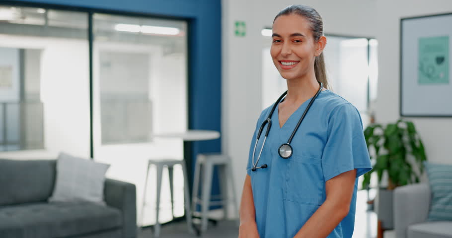 Proud face of woman doctor in busy hospital for healthcare services, leadership and happy career mindset. Confident portrait of young medical professional or female nurse in clinic or health care job Royalty-Free Stock Footage #1101137053