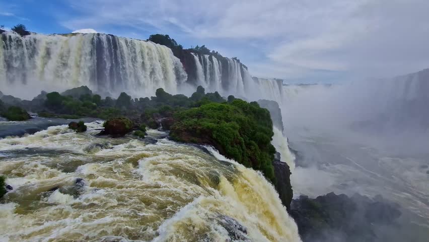 Devil's Throat at Iguazu Falls, one of the world's great natural wonders, on the border of Argentina and Brazil, Latin America Royalty-Free Stock Footage #1101137159