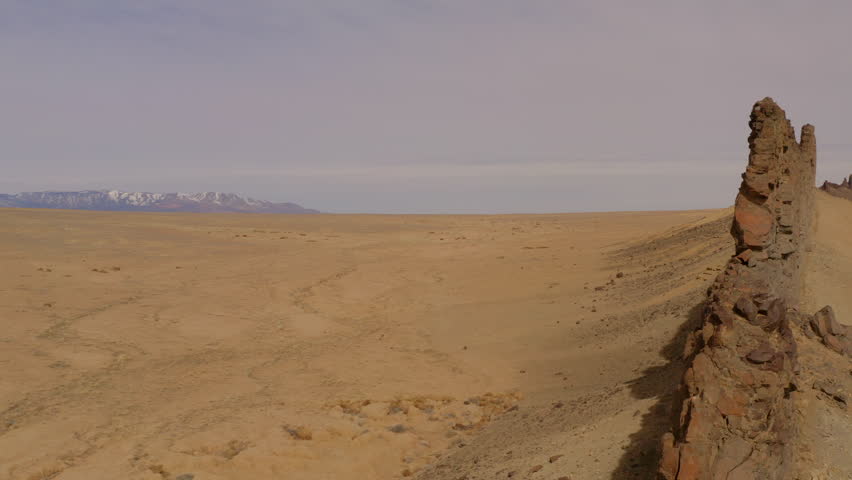 An aerial  view of Shiprock located in Northwest New Mexico above the high desert plains of the Navajo Nation.