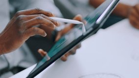 Tablet, engineering and design people in office meeting with motor, engine or energy saving model design with pen sketch. CAD software, business hands and zoom technology or digital product designing - Powered by Shutterstock - Get 15% off with code: PIKWIZARD15