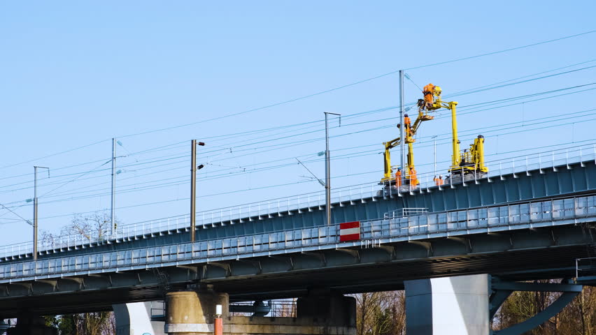 SNCF catenary maintenance team at work on a railway bridge (Paris,France) Royalty-Free Stock Footage #1101155355