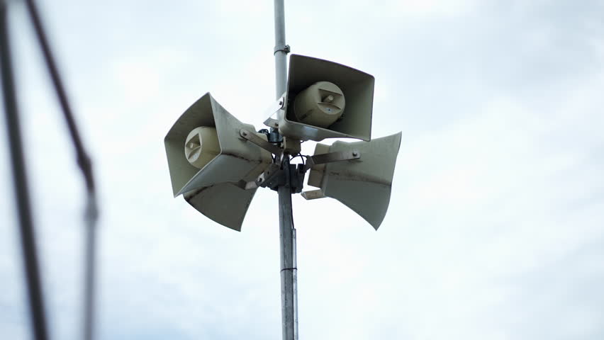 Loudspeakers megaphones at outdoors post to warn and alert the public. Information communication amplifier sound speakers Royalty-Free Stock Footage #1101156425