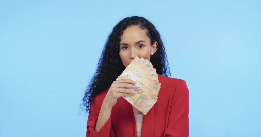 Portrait of business woman with money, euros and mockup, savings and startup loan isolated on blue background. Cash deal, budget sale and success, woman with smile and financial freedom in studio. | Shutterstock HD Video #1101168887