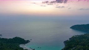 aerial hyperlapse lapse view blue sea around white sand beach at freedom beach Patong Phuket. 
Freedom beach is pure nature with out any building.
abstract nature background.Gradient color. 