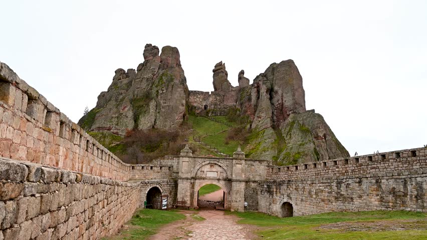 The walls of the old castle in Europe. Medieval fortress. Medieval fortified city. Ancient town. Belogradchik, Bulgaria.