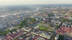Inscription on video. Gothenburg, Sweden. Panorama of the city and the river Goeta Elv. The historical center of the city. Sunset. Heat burns text, Aerial View, Departure of the camera