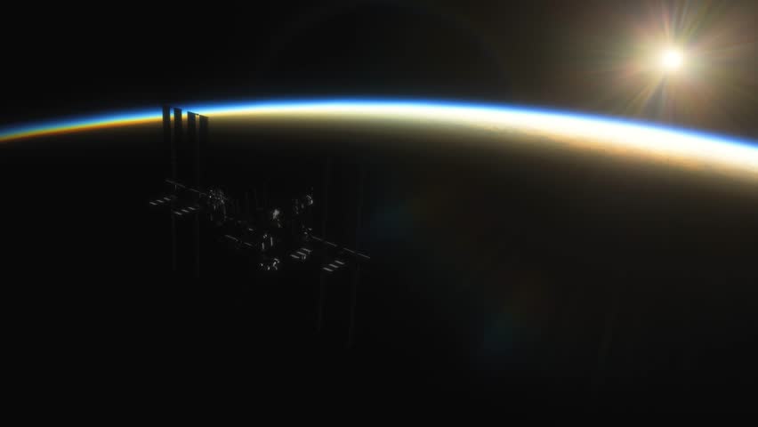 International Space Station ISS Floating in Orbit above Planet Earth in outer space. Sunrise or sunset view from space | Shutterstock HD Video #1101188669