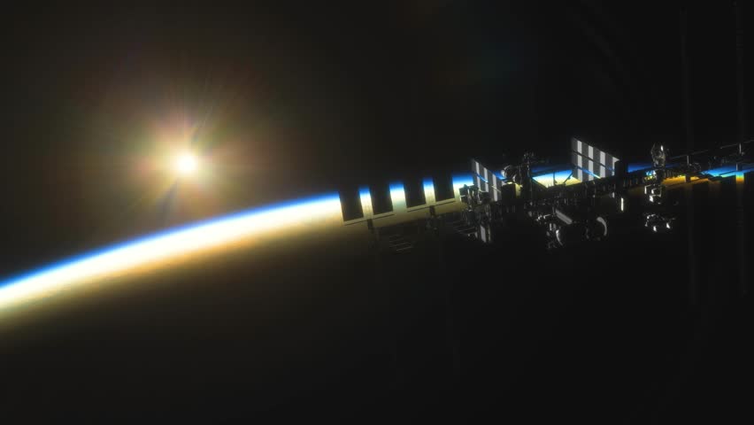 International Space Station ISS Floating in Orbit above Planet Earth in outer space. Sunrise or sunset view from space | Shutterstock HD Video #1101188673
