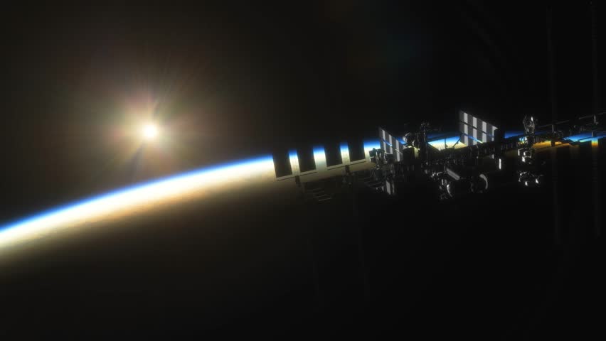 International Space Station ISS Floating in Orbit above Planet Earth in outer space. Sunrise or sunset view from space | Shutterstock HD Video #1101188681