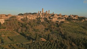 Sunrise hour in San Gimignano. Peaceful morning flight over the coutless toSwers of this Unesco World Heritage site in Tuscany landscape. Video 9