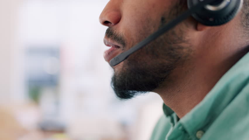 Call center, customer service and profile of man in office consulting for telemarketing. Telemarketer, face and happy male consultant, sales agent or employee with headset mic, discussion and talking | Shutterstock HD Video #1101190665