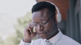 Business man, outdoor and music in the city with headphones and happiness from dance audio. Businessman, radio streaming and listening to a hip hop track with a employee on a work break with a smile - Powered by Shutterstock - Get 15% off with code: PIKWIZARD15
