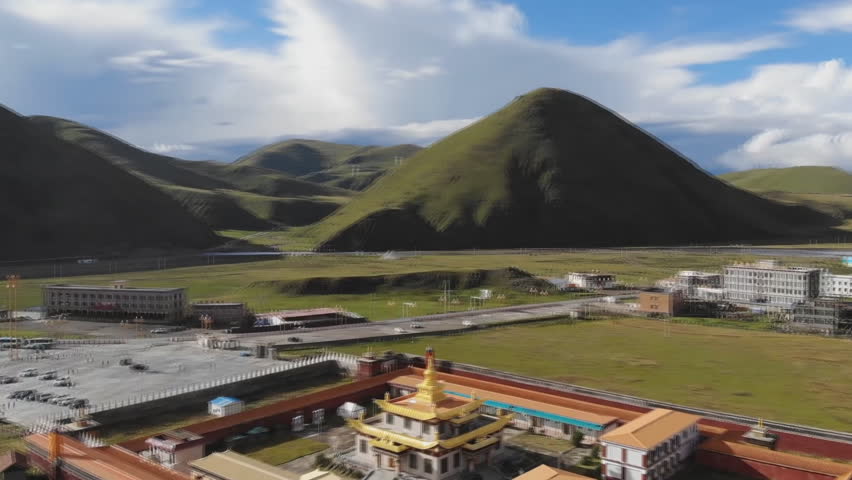 Western Sichuan religious temple mountain range. Tibetan Highlands of Western Sichuan, China. (aerial photography)