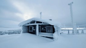 Drone shot of small village Saariselka in Finland in winter. Sami village. Urho Kekkonen National Park. Kaunispää Triangulation Tower. Ski resorts. Walk in Saariselka. Frozen trees in Finland. Sunset. - Powered by Shutterstock - Get 15% off with code: PIKWIZARD15