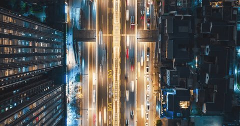 aerial top view urban cityscape timelapse of traffic on the road with high buildings modern city of Chengdu China Stockvideo