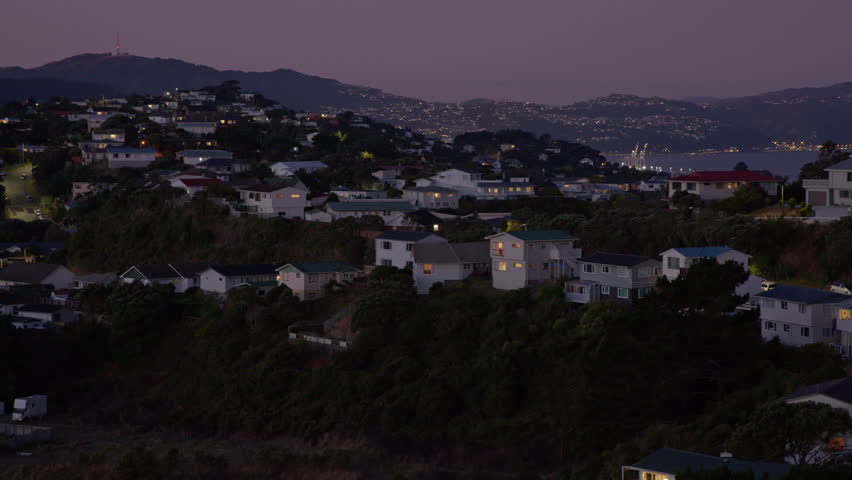 Pan over the cityscape of Wellington at dusk, the capital of New Zealand
