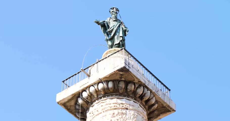 Saint Paul statue on top of the Column of Marcus Aurelius in Rome, Italy.