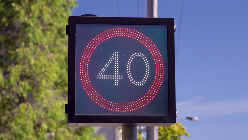 Electronic 40 kilometer per hour road sign in Australia Royalty-Free Stock Footage #1101223885