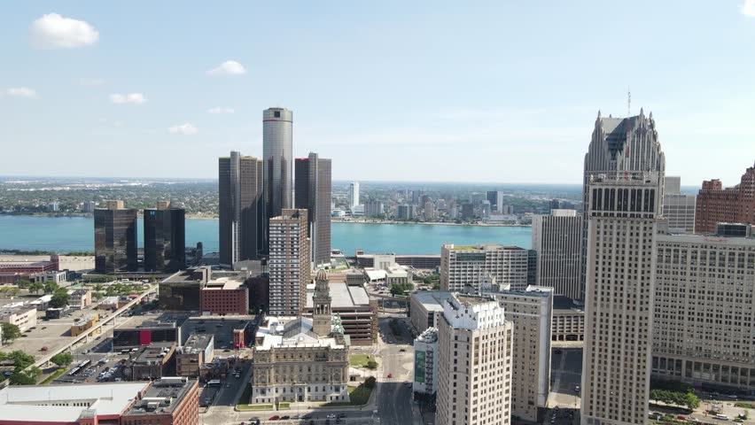 Waterfront Skyscrapers Of GM Renaissance Center In Downtown Detroit, Michigan, United States. Aerial Wide Shot