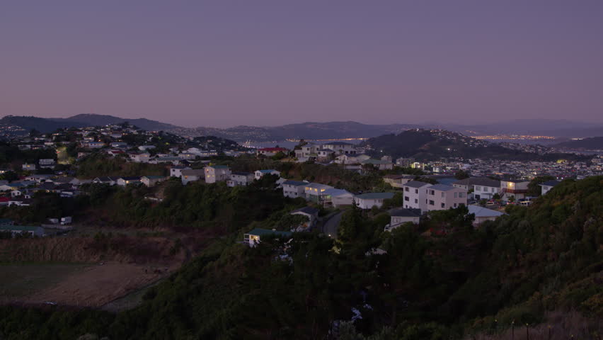 Wide shot of residential area of Wellington at dusk, the capital of New Zealand