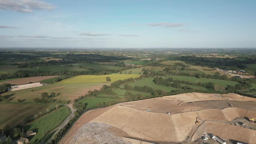 Mayenne countryside, France. Aerial forward and sky for copy space