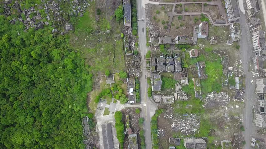 Aerial cenital shot over dilapidated buildings in Lidung County, Sichuan Province, China, after the earthquake.