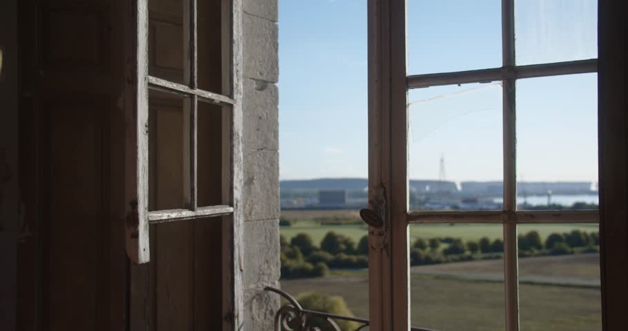 A Beautiful Woman With Braided Hair Opening A Vintage Window During Sunny Morning. Slow Motion