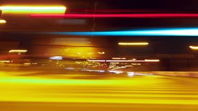 Motion timelapse of a speedy night drive in a big city