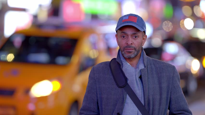 African-American Man in the streets of New York at Times Square - travel photography
