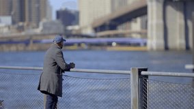 African-American Man at Brooklyn Bridge New York - travel photography