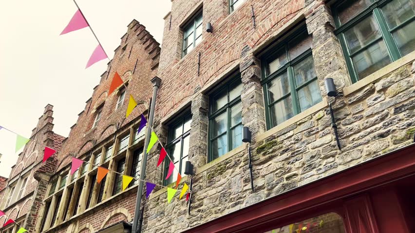 Beautiful historical and medieval houses on the street of Ghent, a city in the Flemish region of Belgium. Travel concept High quality 4k footage