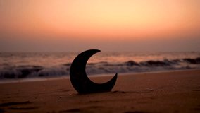 Lantern lamp with Crescent moon shape on the beach, Ramadan Karem and Eid Mubarak Concept video