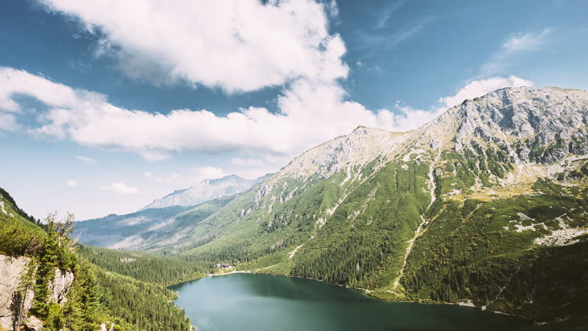 Calm Lake Under Summer Mountains Landscape. Beautiful Nature, Scenic View Of Lakes Valley. Amazing Sunrays Above Mountains Lake Landscape.