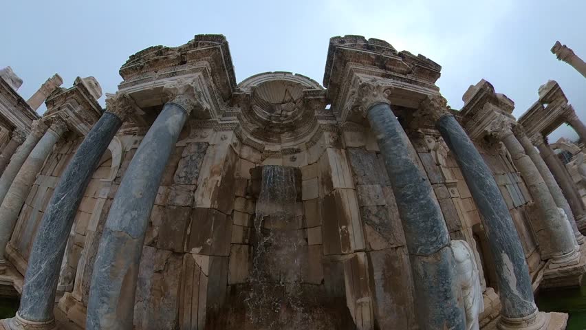 Sagalassos ancient city, Mystical view of the monumental Antonines fountain Nymphaeum in the mist. Turkey Burdur Ağlasun