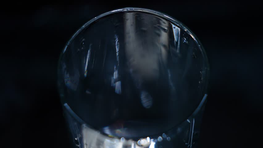Clean drinking water from the tap. Slow motion. A glass of water, a beautiful frame. Concept: thirst, saving resources, water use, utility prices, flushing money down the drain. | Shutterstock HD Video #1101266243