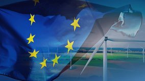 Slow motion of EU flag with wind turbines as background. Green energy and climate change concept, 4K - Powered by Shutterstock - Get 15% off with code: PIKWIZARD15