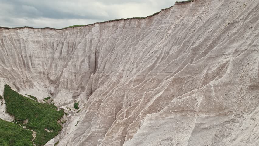 Russia, Kuril Islands, Iturup Island, White rocks on the coast of the Sea of Okhotsk.