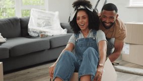 Black couple, moving and new house while happy, excited and playful while in cardboard box for fun while unpacking. Man and woman excited as home owners after mortgage or loan approval for property - Powered by Shutterstock - Get 15% off with code: PIKWIZARD15