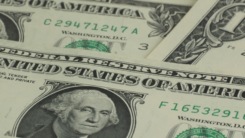 American one dollar paper money pile on desk. US Dollar bills one dollar bills background close-up. Concept of finance and money payment. Royalty-Free Stock Footage #1101280329