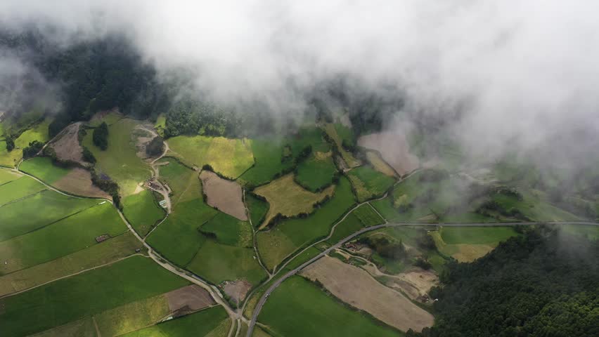 Aerial view of a road crossing agricultural fields, San Miguel Island, Azores archipelagos, Portugal.