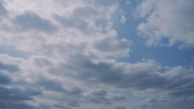 Timelapse of blue sky and white clouds 4K UHD