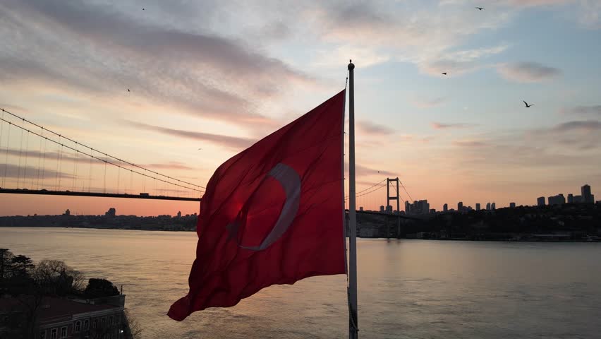 Turkish Flag in the Sunset Time Drone Video, 15 July Martyrs Bridge Beylerbeyi, Uskudar Istanbul, Turkiye 