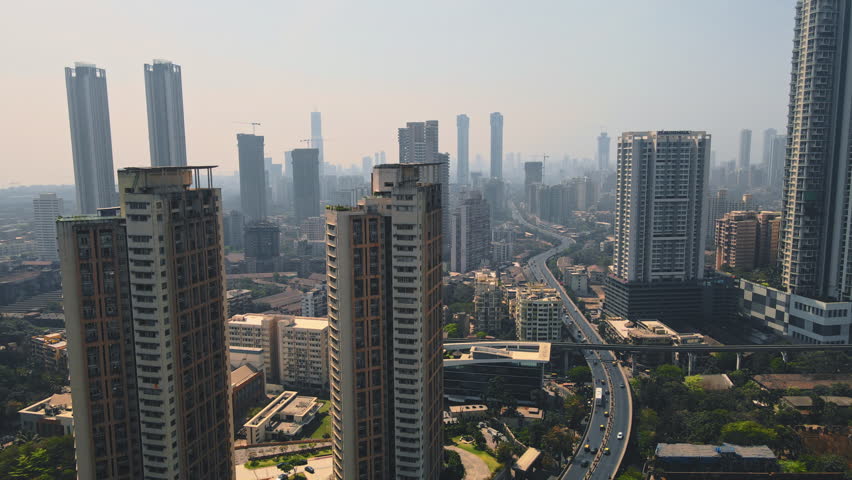 Cinematic Aerial of View Mumbai City. 4k, Drone flying above the Indian city. Modern City high-rise skyscraper buildings in Mumbai City. Royalty-Free Stock Footage #1101303919