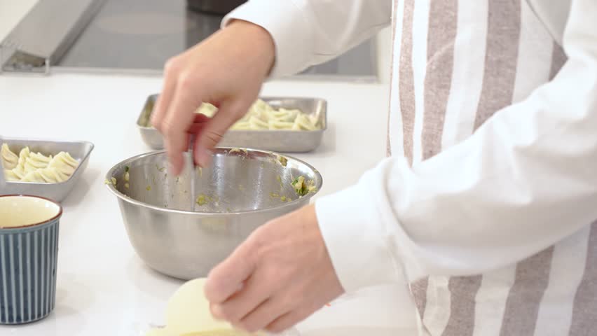man in his 40s who makes dumplings at home