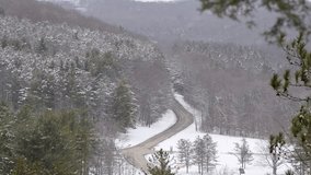 Mountain road snow winter season woodlands park, cars, transportation, nature landscape 4k resolution video