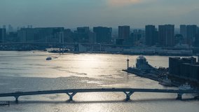 Tokyo Bay and the Rainbow Bridge timelapse at sunset