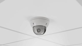 4K video security dome camera. The camera hangs on the ceiling and shoots. Seamless loop cycle animation.