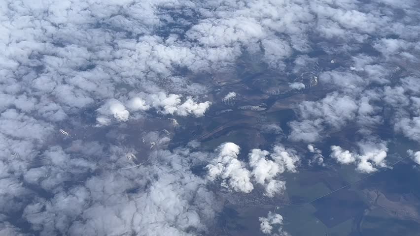 Flight in the clouds, view from the plane